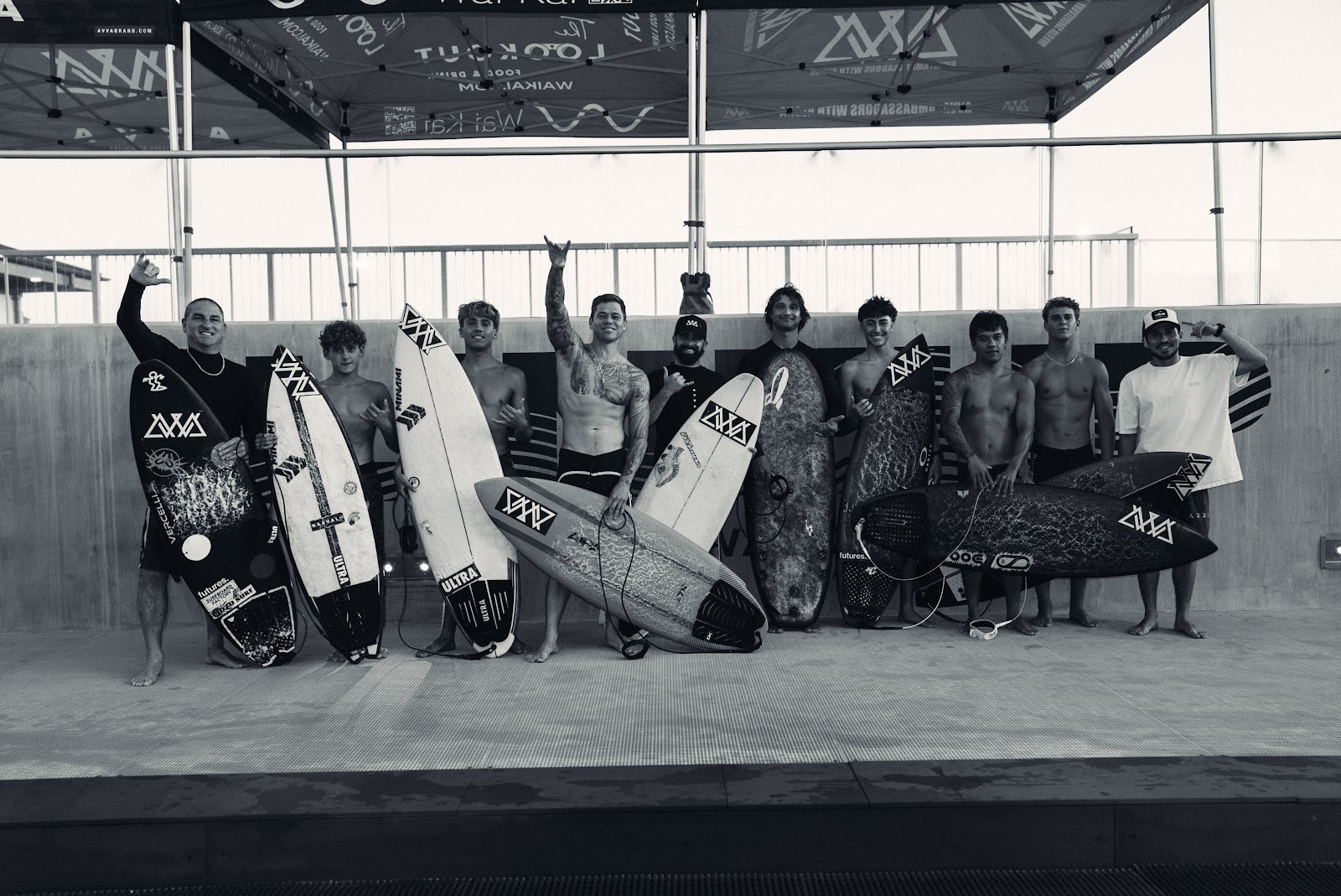 AVVA surf team with their branded surfboards
